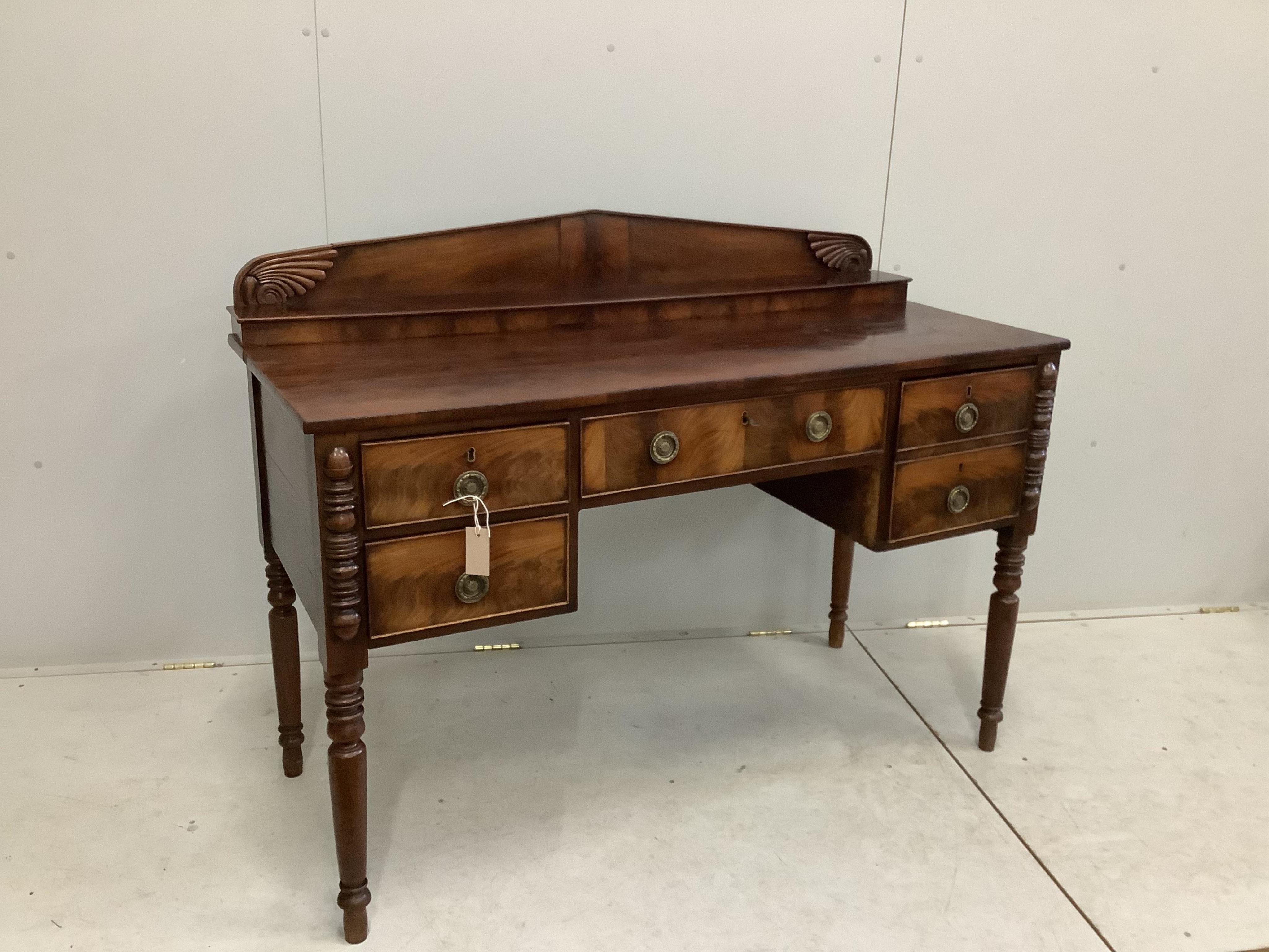 A Regency mahogany sideboard, width 126cm, depth 58cm, height 103cm. Condition - fair but missing two pieces of moulding to kneehole